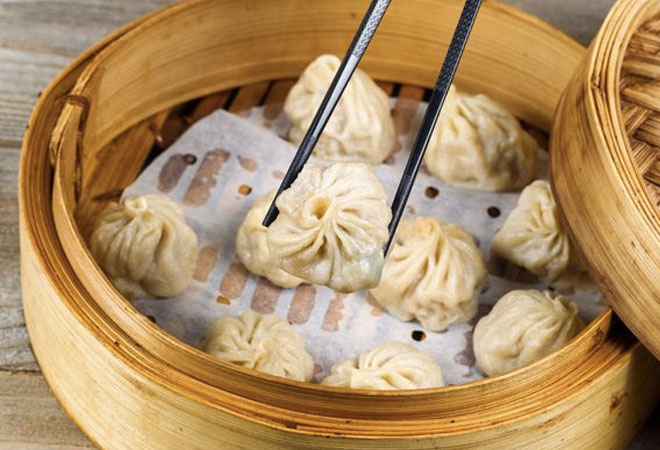 сяо лун бао. паровые пельмени сяо лун бао. китайские пельмени сяо лун бао. пельмени сяо лун бао. баоцзы шанхай.